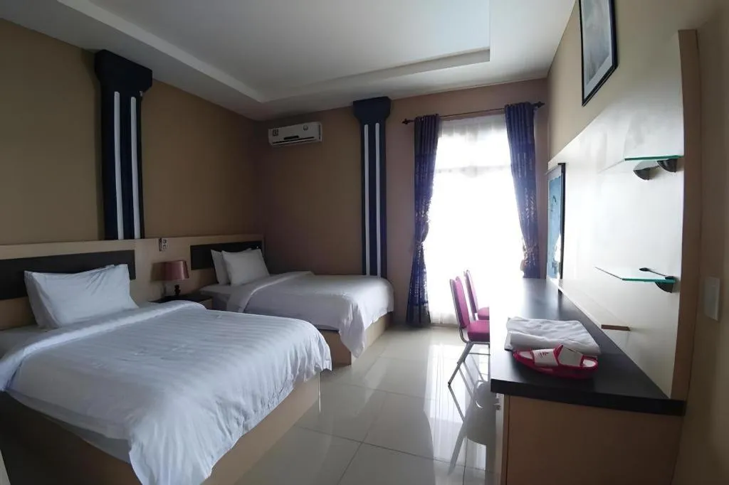 Bed in Samosir Cottages Resort