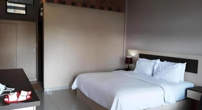 Bed in Samosir Cottages Resort