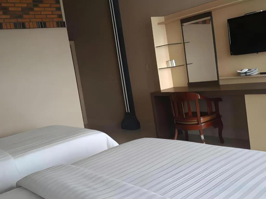Bed in Samosir Cottages Resort