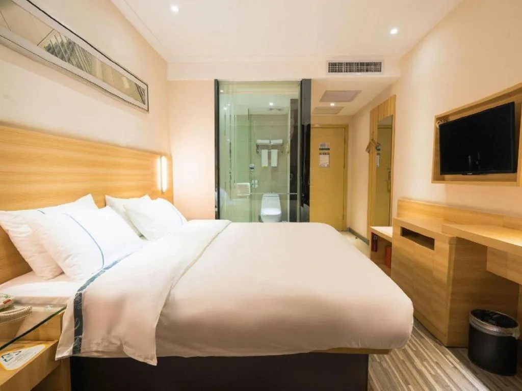 Bed in City Comfort Inn Wuhan High Speed Railway Station