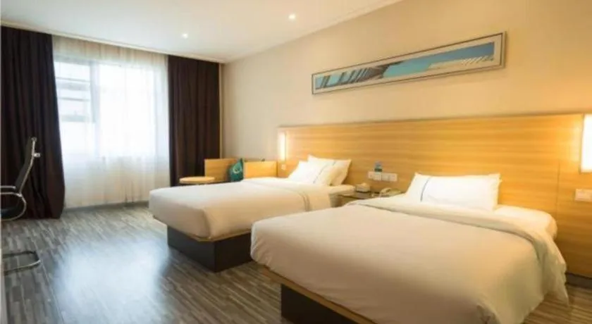Bed in City Comfort Inn Wuhan High Speed Railway Station