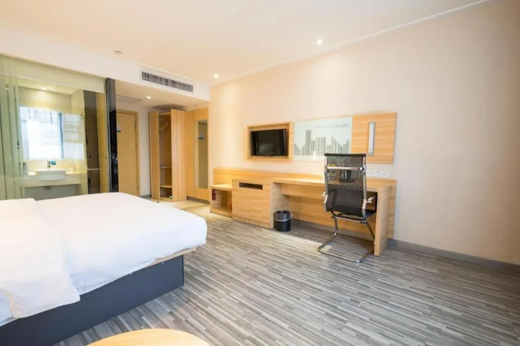 Bed in City Comfort Inn Wuhan High Speed Railway Station