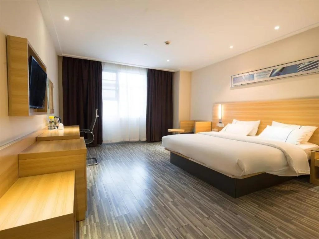 Bed in City Comfort Inn Wuhan High Speed Railway Station