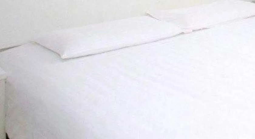 Bed in City Comfort Inn Wuhan High Speed Railway Station