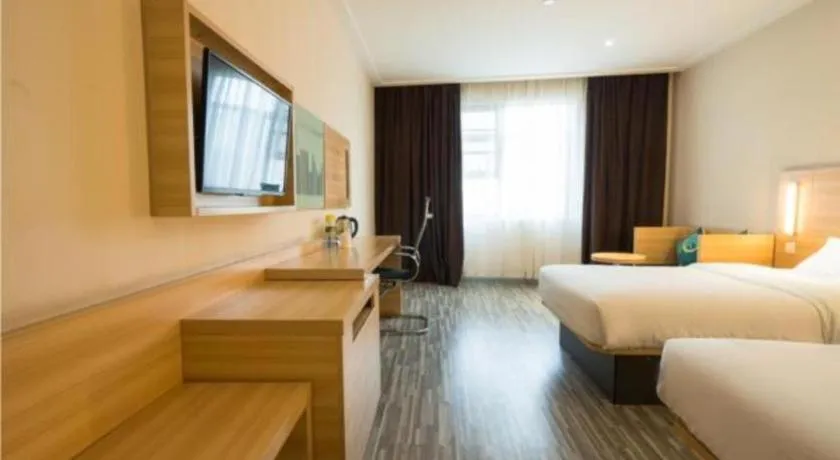 Bed in City Comfort Inn Wuhan High Speed Railway Station