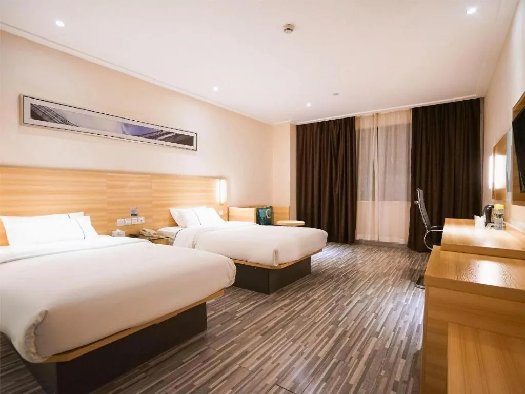 Bed in City Comfort Inn Wuhan High Speed Railway Station