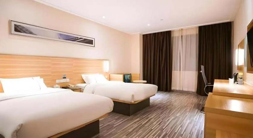 Bed in City Comfort Inn Wuhan High Speed Railway Station