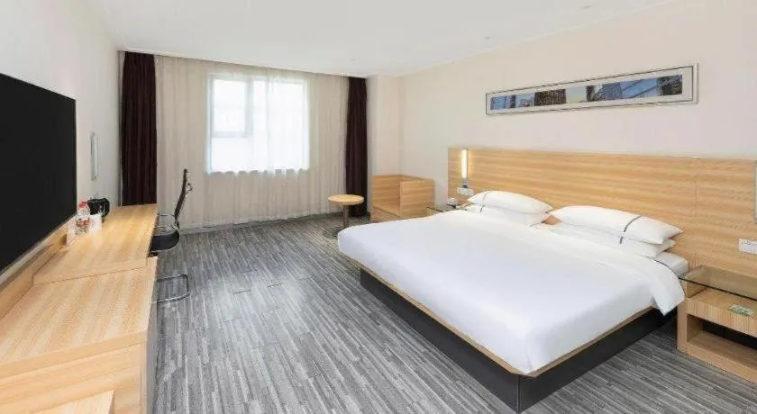 Bed in City Comfort Inn Wuhan High Speed Railway Station