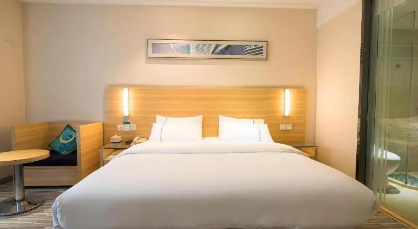 Bed in City Comfort Inn Wuhan High Speed Railway Station