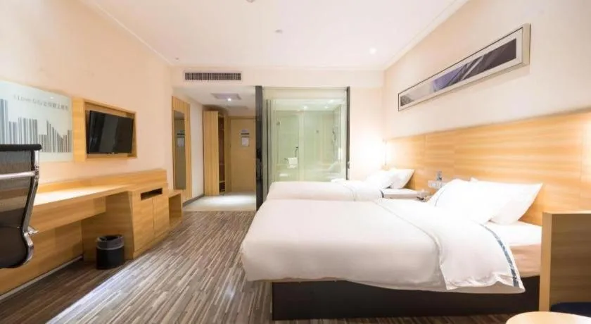 Bed in City Comfort Inn Wuhan High Speed Railway Station