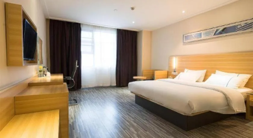 Bed in City Comfort Inn Wuhan High Speed Railway Station