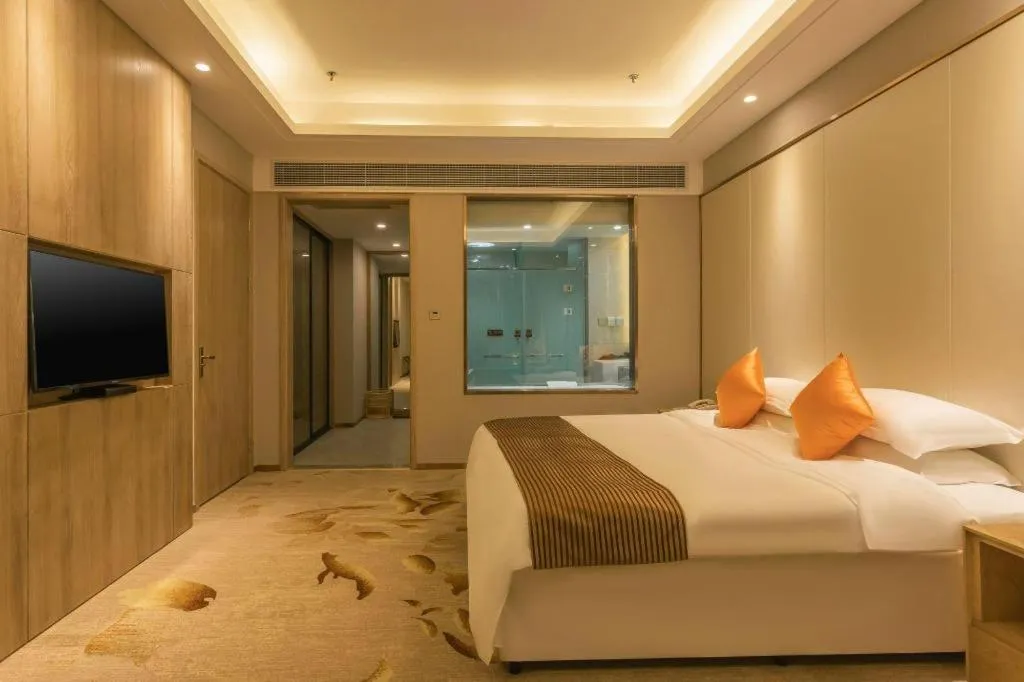 Bed in Dezhou Regal Kangbo Hotel