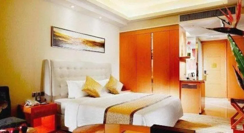 Bed in Dezhou Regal Kangbo Hotel