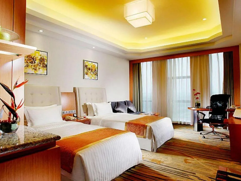 Bed in Dezhou Regal Kangbo Hotel