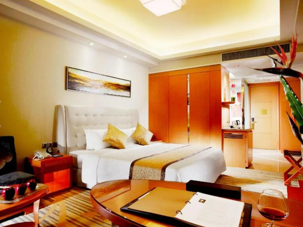 Bed in Dezhou Regal Kangbo Hotel