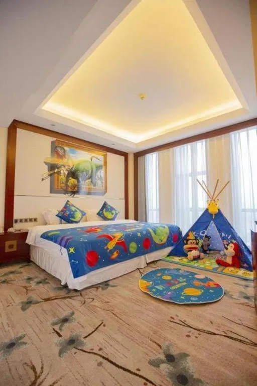 Bed in Dezhou Regal Kangbo Hotel