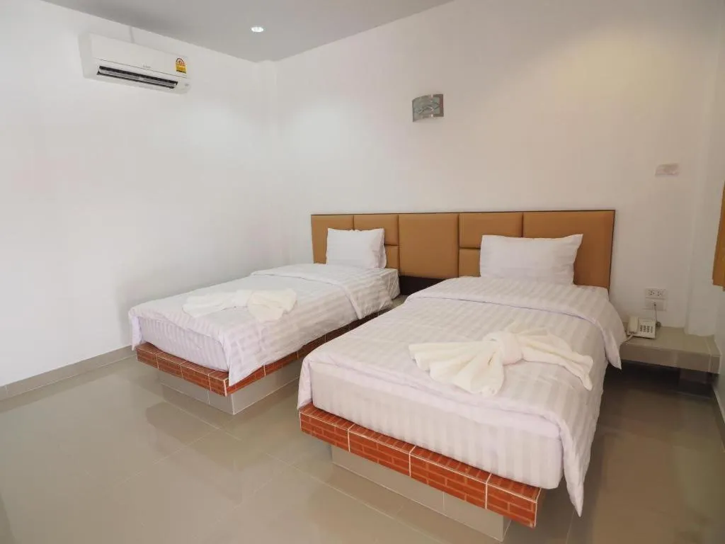 Bed in The Phant Hotel