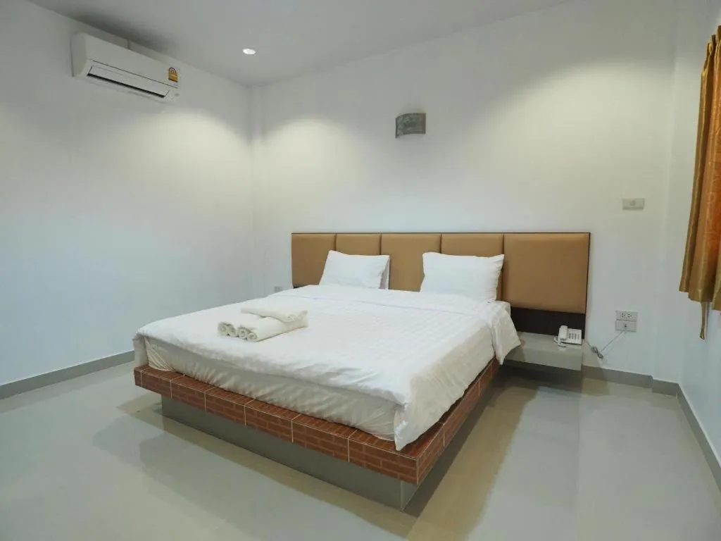 Bed in The Phant Hotel