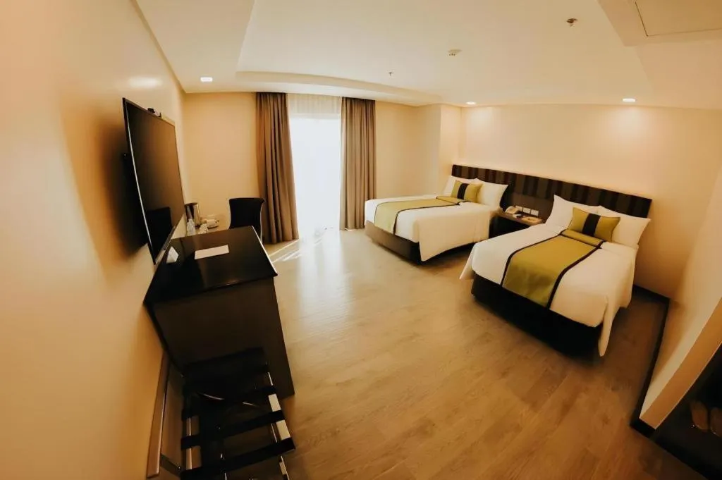 Bed in Grand Xing Imperial Hotel