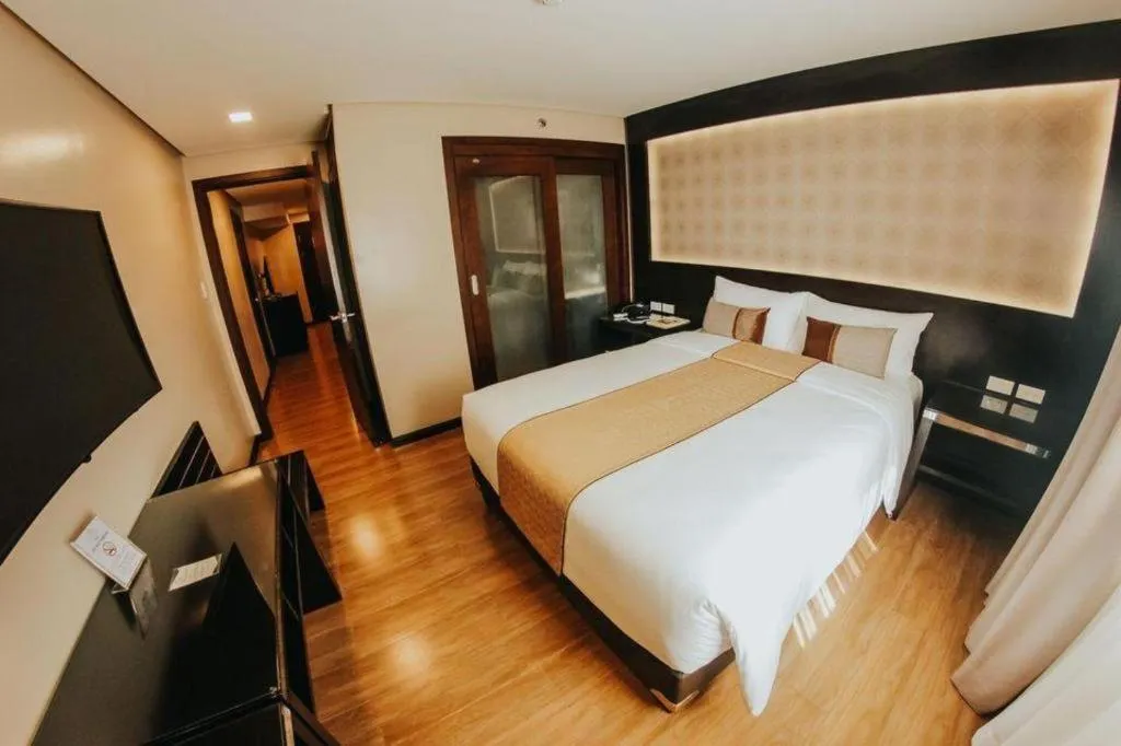 Bed in Grand Xing Imperial Hotel