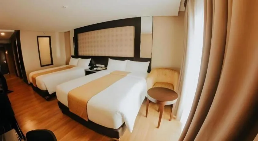 Bed in Grand Xing Imperial Hotel