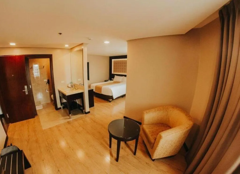 Bed in Grand Xing Imperial Hotel