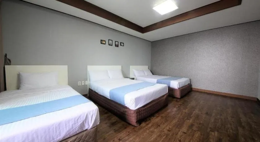 Bed in Woorim Hotel