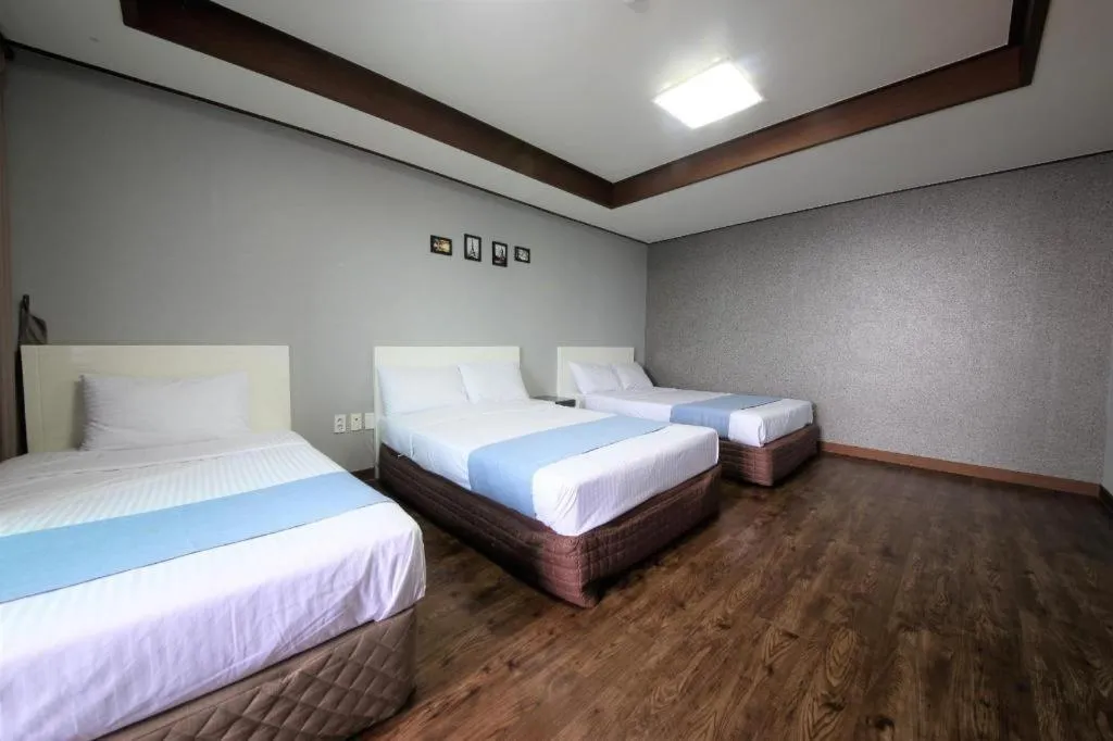 Bed in Woorim Hotel