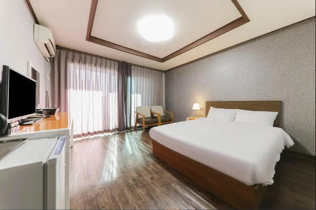 Bed in Woorim Hotel