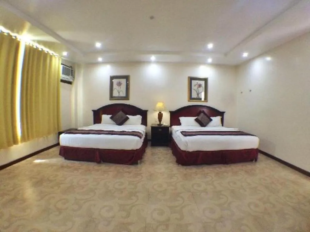 Bed in Cindy Kelly Hotel