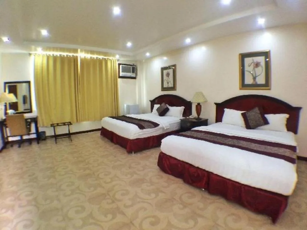 Bed in Cindy Kelly Hotel