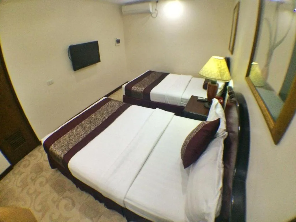 Bed in Cindy Kelly Hotel