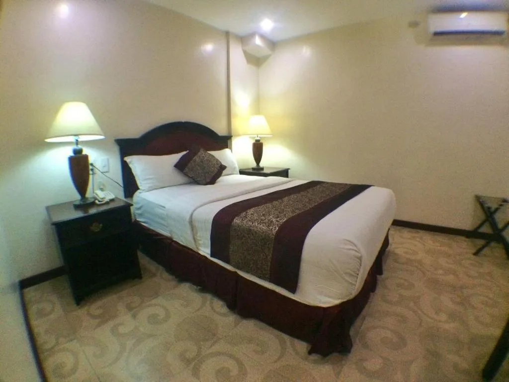 Bed in Cindy Kelly Hotel