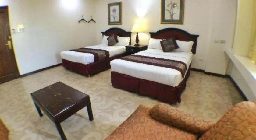 Bed in Cindy Kelly Hotel