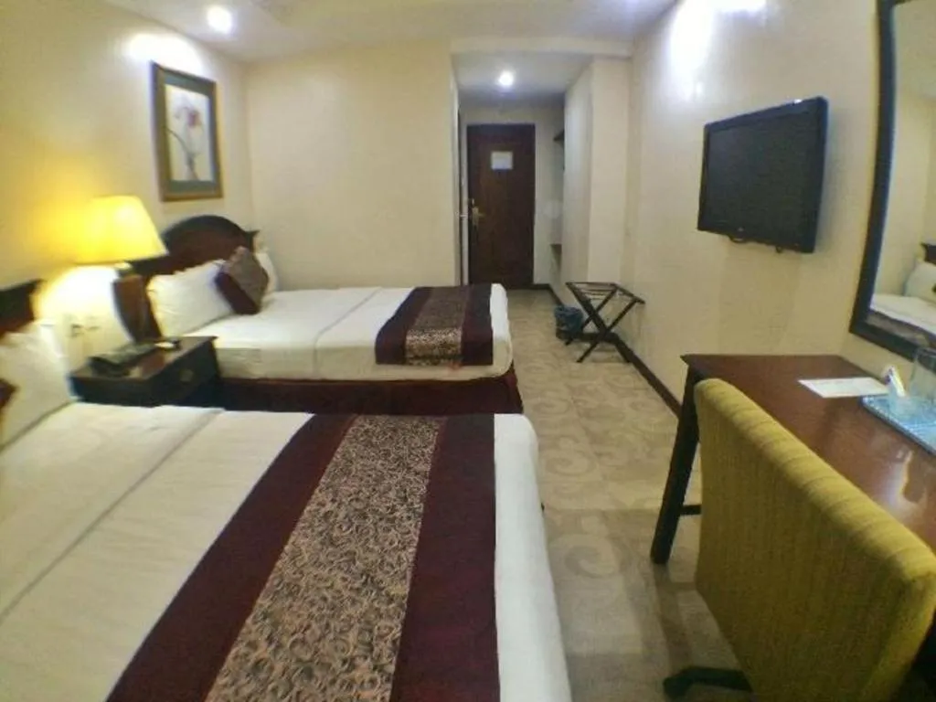 Bed in Cindy Kelly Hotel