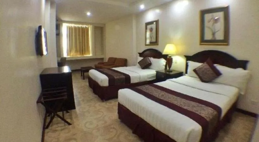 Bed in Cindy Kelly Hotel