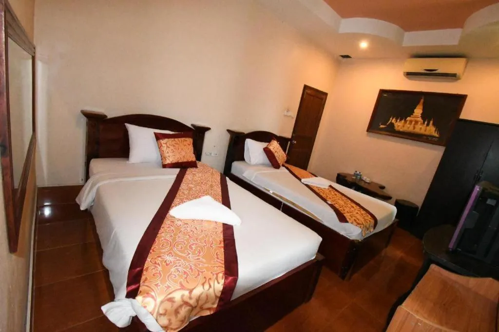 Bed in PXT Hotel