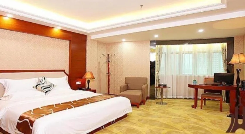 Bed in Borrman Hotel Guangzhou Tianhe Tangdong Subway Station Convention and Exhibition Center
