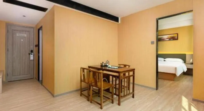 Bed in Borrman Hotel Guangzhou Tianhe Tangdong Subway Station Convention and Exhibition Center