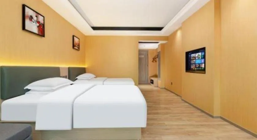 Bed in Borrman Hotel Guangzhou Tianhe Tangdong Subway Station Convention and Exhibition Center