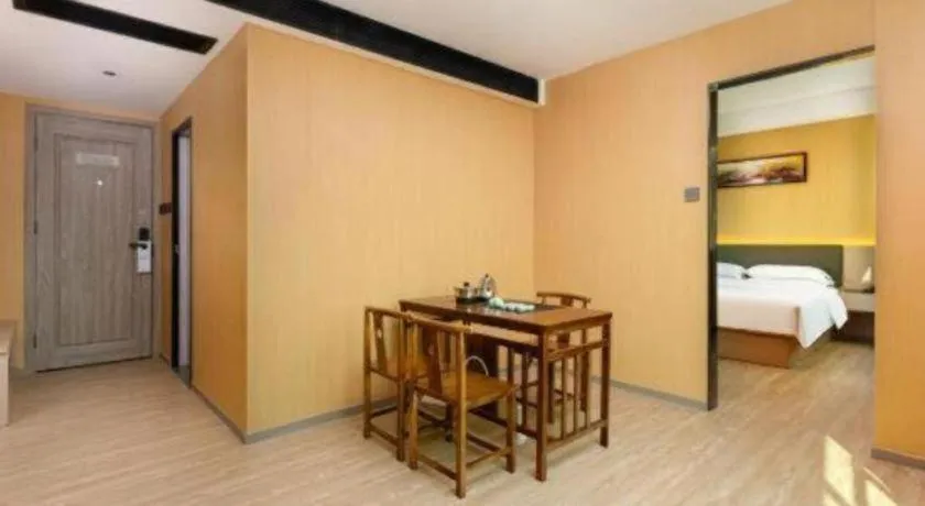 Bed in Borrman Hotel Guangzhou Tianhe Tangdong Subway Station Convention and Exhibition Center