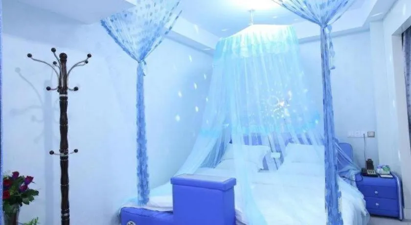 Bed in Borrman Hotel Guangzhou Tianhe Tangdong Subway Station Convention and Exhibition Center