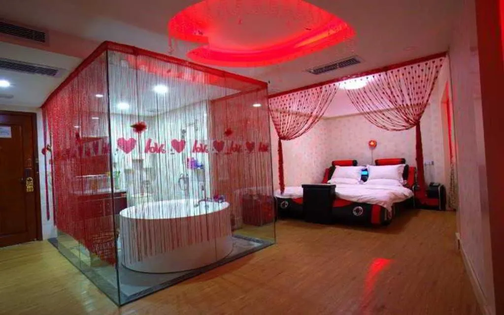 Bed in Borrman Hotel Guangzhou Tianhe Tangdong Subway Station Convention and Exhibition Center