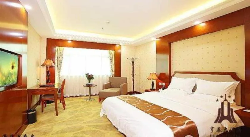 Bed in Borrman Hotel Guangzhou Tianhe Tangdong Subway Station Convention and Exhibition Center