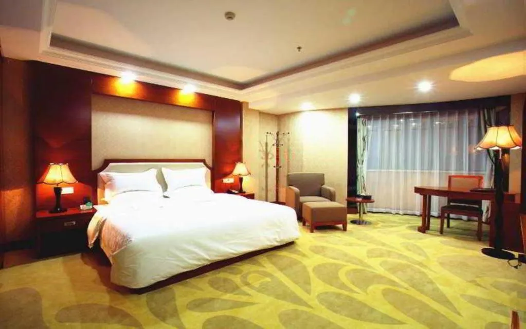 Bed in Borrman Hotel Guangzhou Tianhe Tangdong Subway Station Convention and Exhibition Center