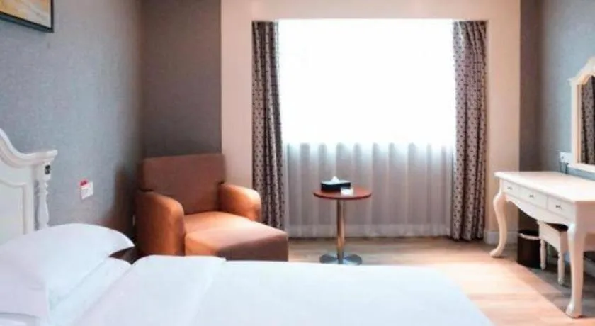 Bed in Borrman Hotel Guangzhou Tianhe Tangdong Subway Station Convention and Exhibition Center