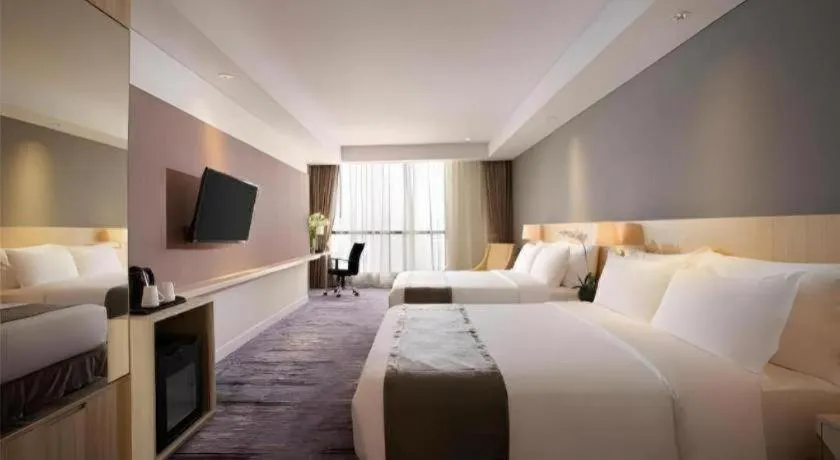 Bed in Hotel Grandhika Pemuda