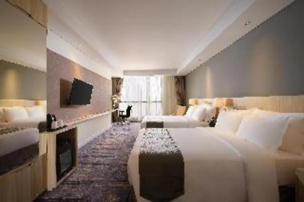 Bed in Hotel Grandhika Pemuda