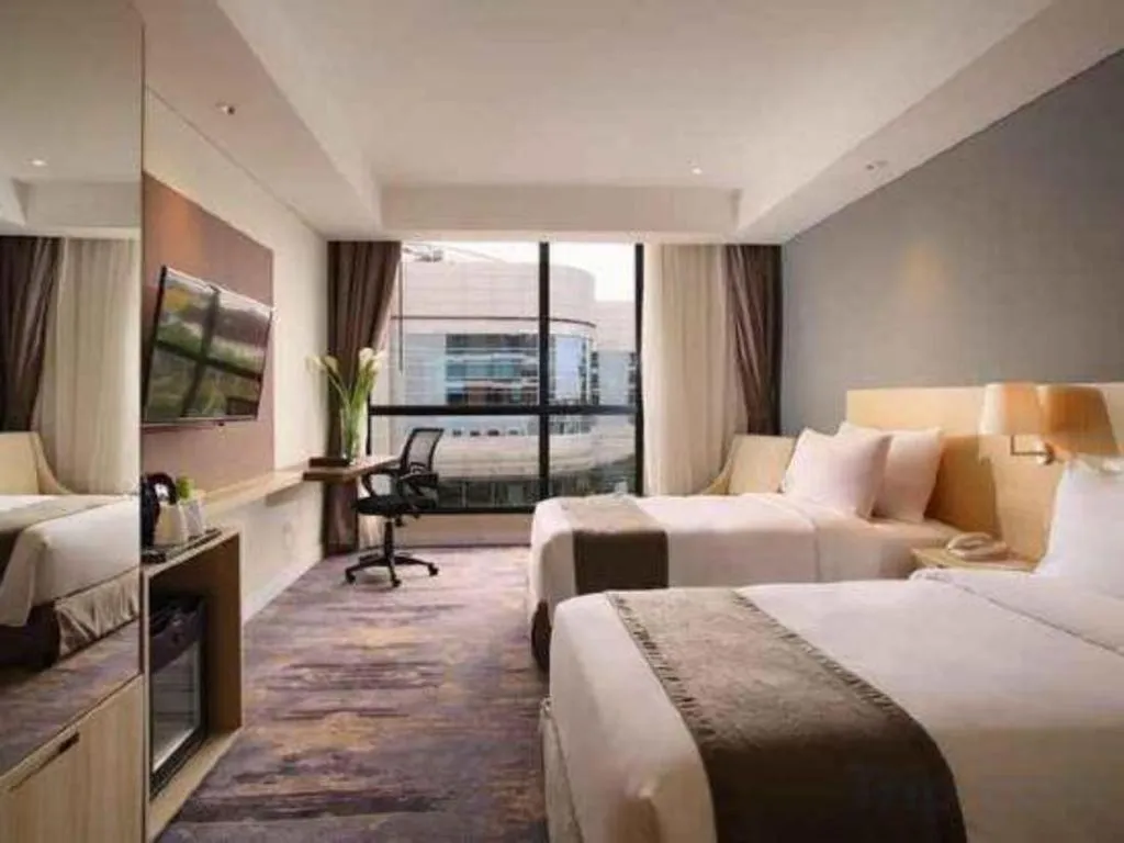 Bed in Hotel Grandhika Pemuda