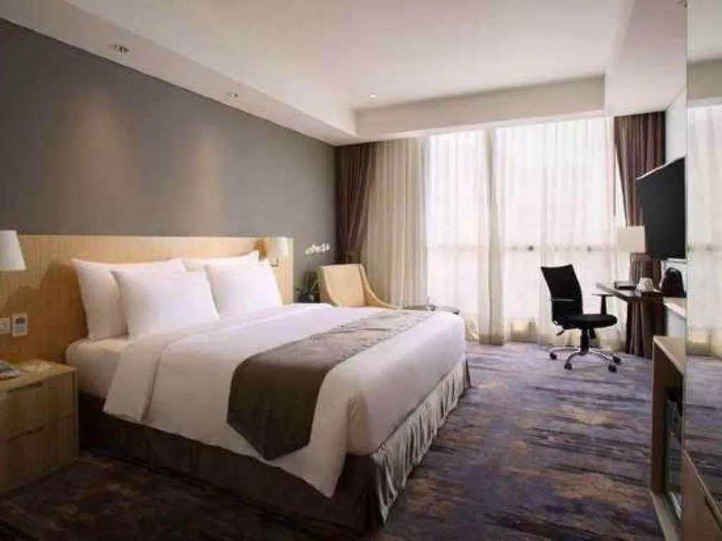 Bed in Hotel Grandhika Pemuda